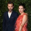 Jamie Dornan et sa femme Amelia Warner lors du dîner "Chanel and Charles Finch Pre-Oscar Awards" au restaurant Madeo à Los Angeles, le 3 mars 2018.