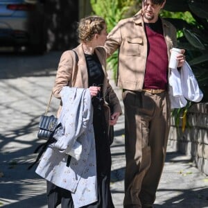 Exclusif - Amber Heard embrasse son nouveau compagnon Andy Muschietti dans la rue à Los Angeles le 13 mars 2019.