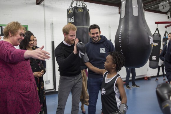 Le prince Harry, duc de Sussex, et Meghan Markle, duchesse de Sussex, enceinte visitent l'association Empire Fighting Chance qui utilise la boxe pour soutenir les enfants qui échouent à l'école. Bristol le 1er février 2019.