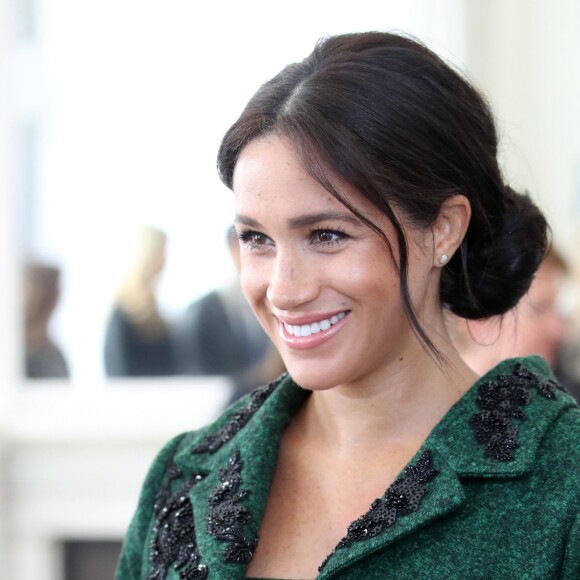 Meghan Markle la duchesse de Sussex enceinte et le prince Harry, duc de Sussex, assistent à une activité jeunesse le Jour du Commonwealth à la Maison du Canada le 11 mars 2019 à Londres.