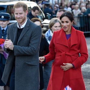 Le prince Harry, duc de Sussex, et Meghan Markle, duchesse de sussex, enceinte, lors d'une visite à Birkenhead le 14 janvier 2019.