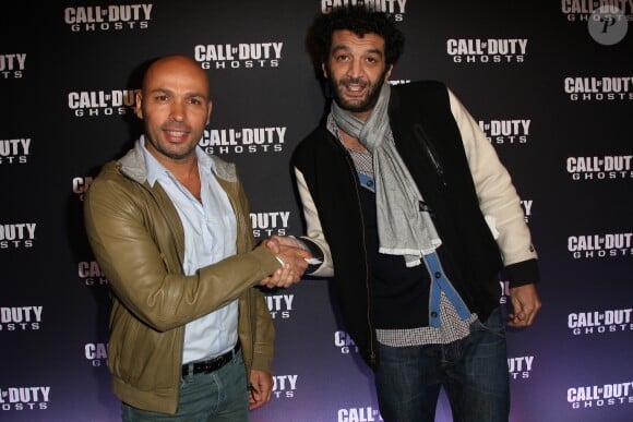 Eric Judor et Ramzy Bedia - Soirée de lancement du jeu "Call of Duty Ghost" au Palais de Tokyo à Paris le 4 novembre 2013