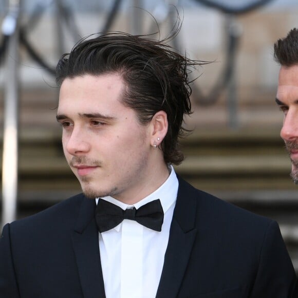 David Beckham et son fils Brooklyn à la première de la série Netflix "Our Planet" au Musée d'Histoires Naturelles à Londres, le 4 avril 2019.