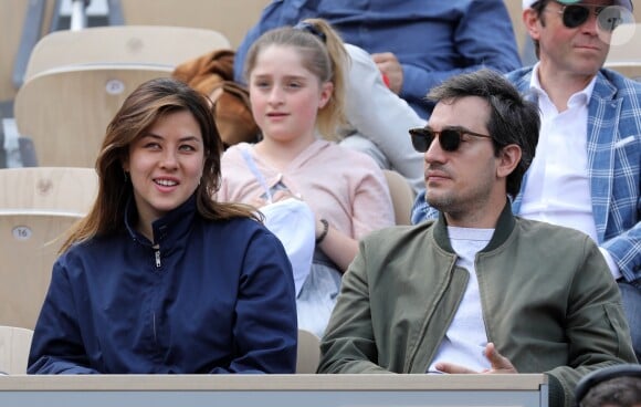 Mylène Jampanoï et son compagnon Dimitri Stephanides dans les tribunes de Roland-Garros à Paris, le 29 mai 2019. © Jacovides-Moreau/Bestimage