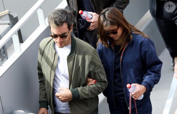 Mylène Jampanoï et son compagnon Dimitri Stephanides dans les tribunes de Roland-Garros à Paris, le 29 mai 2019. © Jacovides-Moreau/Bestimage