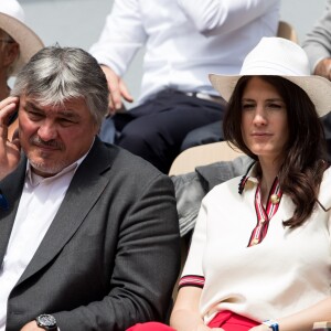 David Douillet et sa femme Vanessa dans les tribunes de Roland-Garros à Paris, le 29 mai 2019. © Jacovides-Moreau/Bestimage