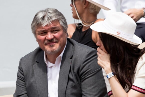David Douillet et sa femme Vanessa dans les tribunes de Roland-Garros à Paris, le 29 mai 2019. © Jacovides-Moreau/Bestimage