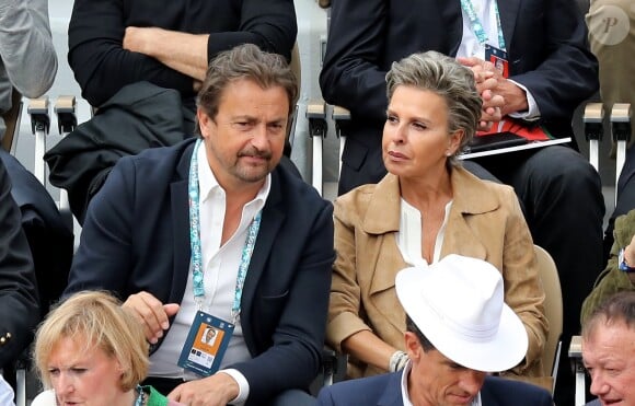 Henri Leconte et Maria Dowlatshahi dans les tribunes de Roland-Garros à Paris, le 29 mai 2019. © Jacovides-Moreau/Bestimage