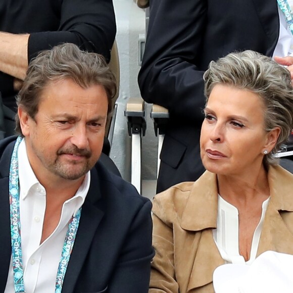 Henri Leconte et Maria Dowlatshahi dans les tribunes de Roland-Garros à Paris, le 29 mai 2019. © Jacovides-Moreau/Bestimage