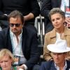Henri Leconte et Maria Dowlatshahi dans les tribunes de Roland-Garros à Paris, le 29 mai 2019. © Jacovides-Moreau/Bestimage