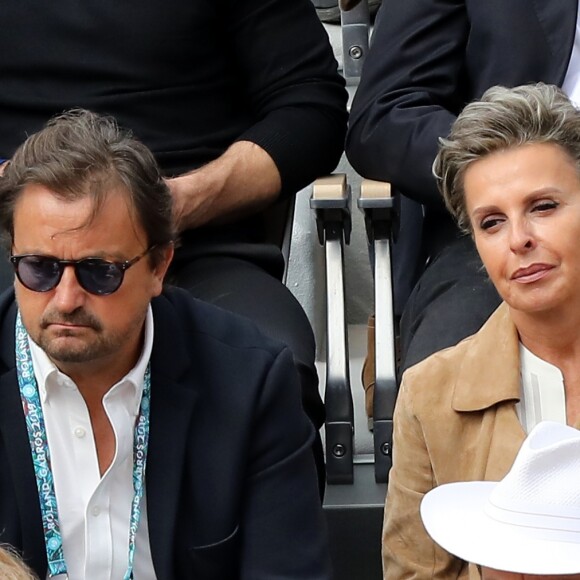 Henri Leconte et Maria Dowlatshahi dans les tribunes de Roland-Garros à Paris, le 29 mai 2019. © Jacovides-Moreau/Bestimage