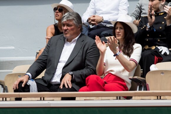 David Douillet et sa femme Vanessa dans les tribunes de Roland-Garros à Paris, le 29 mai 2019. © Jacovides-Moreau/Bestimage