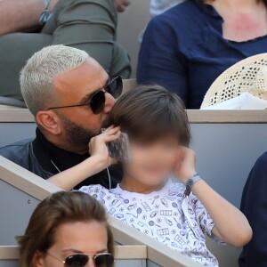 Cyril Hanouna et son fils Lino dans les tribunes lors des internationaux de tennis de Roland Garros à Paris, France, le 31 mai 2019. © Jacovides-Moreau/Bestimage