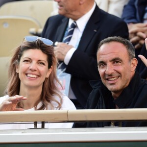 Nikos Aliagas et sa femme Tina dans les tribunes lors des internationaux de tennis de Roland Garros à Paris, France, le 31 mai 2019. © Jean-Baptiste Autissier/Panoramic/Bestimage