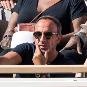 Nikos Aliagas et sa femme Tina dans les tribunes lors des internationaux de tennis de Roland Garros à Paris, France, le 31 mai 2019. © Jacovides-Moreau/Bestimage