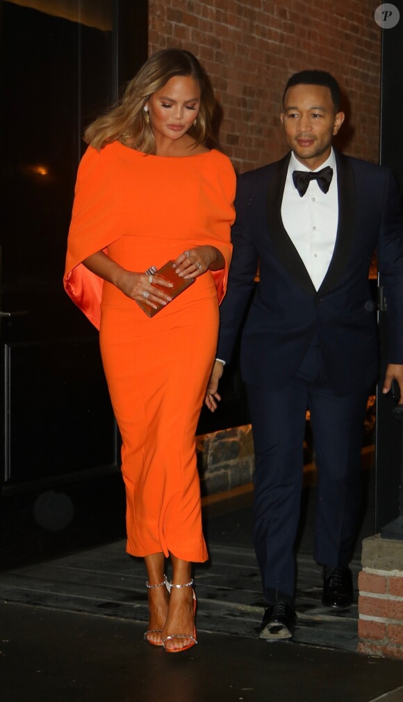 Chrissy Teigen et son mari John Legend se rendent au gala de charité du 50ème anniversaire de Sesame Workshop à Cipriani Wall Street à New York, le 29 mai 2019.
