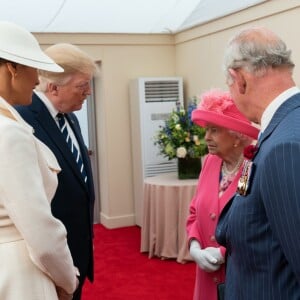Le président des Etats-Unis Donald Trump et sa femme Melania, le prince Charles et la reine Elisabeth II d'Angleterre - Cérémonie à Portsmouth pour le 75ème anniversaire du débarquement en Normandie pendant la Seconde Guerre Mondiale. Le 5 juin 2019