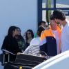 Exclusif - Kevin Trapp et sa compagne Izabel Goulart ont été aperçus en train de s'embrasser à l'aéroport en Crète, le 23 juin 2019.