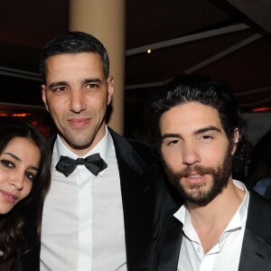 Exclusif - Leila Bekhti pose avec son mari Tahar Rahim et son frère Ahmed - Soirée Magnum lors du 66e festival de Cannes le 17 mai 2013.