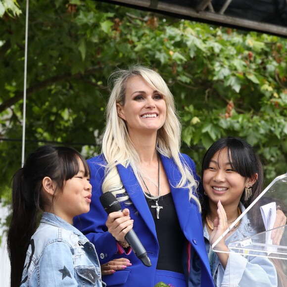 Laeticia Hallyday et ses filles Joy et Jade - Laeticia Hallyday et ses filles Jade et Joy inaugurent une esplanade portant le nom de Johnny Hallyday située en face du Zénith de Toulouse, le 15 juin 2019, date hautement symbolique puisque le rockeur aurait eu 76 ans. © Dominique Jacovides/Bestimage