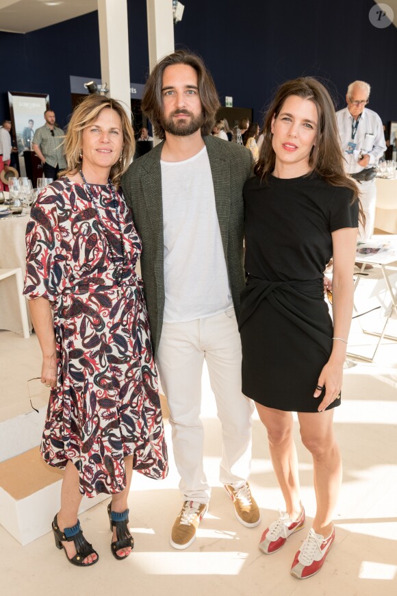 Exclusif - Virginie Coupérie Eiffel (Présidente de Paris Eiffel Jumping), Dimitri Rassam, sa femme Charlotte Casiraghi dans la tente VIP lors du Longines Paris Eiffel Jumping au Champ de Mars à Paris, le samedi 6 juillet 2019. © Luc Castel/Bestimage