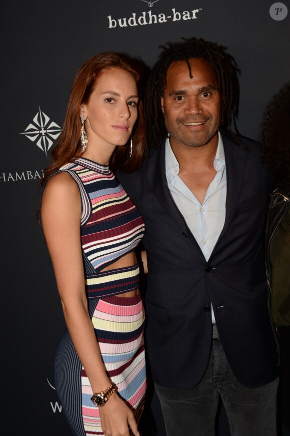 Christian Karembeu et sa femme Jackie Chamoun - A l'occasion des 20 ans de la victoire de l'équipe de France, les bleus 98 se sont rendus à un dîner organisé au Buddha Bar avec tous les joueurs et leur famille le 11 juin 2018. © Rachid Bellak/Bestimage
