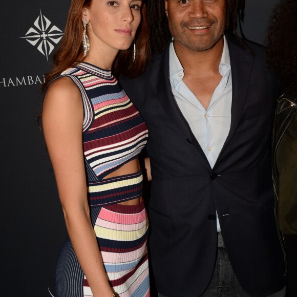 Christian Karembeu et sa femme Jackie Chamoun - A l'occasion des 20 ans de la victoire de l'équipe de France, les bleus 98 se sont rendus à un dîner organisé au Buddha Bar avec tous les joueurs et leur famille le 11 juin 2018. © Rachid Bellak/Bestimage