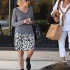 Exclusif - Sharon Stone, vêtue d'un haut avec l'inscription "Amour" dans le dos, fait du shopping chez "Barneys New York" avec une amie à Beverly Hills, le 2 juillet 2019.