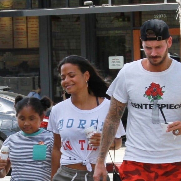 Matt Pokora, sa compagne Christina Milian enceinte et sa fille Violet Nash se rendent au glacier McConnell pour le goûter après avoir acheté des vêtements pour bébés à Los Angeles, le 3 août 2019.