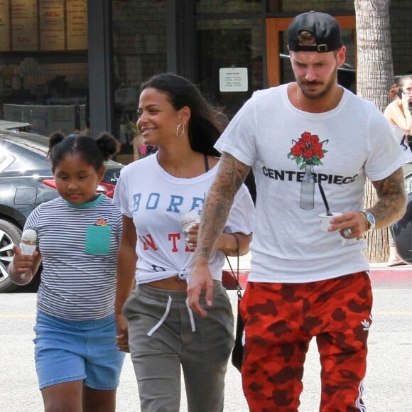 Matt Pokora, sa compagne Christina Milian enceinte et sa fille Violet Nash se rendent au glacier McConnell pour le goûter après avoir acheté des vêtements pour bébés à Los Angeles, le 3 août 2019.