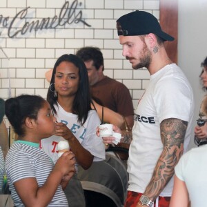 Matt Pokora, sa compagne Christina Milian enceinte et sa fille Violet Nash - Enceinte et radieuse, C.Milian se rend au glacier McConnell avec compagnon M.Pokora et sa fille V.Nash pour le goûter après avoir acheté des vêtements pour bébés. La chanteuse 'Dip it Low' et son compagnon ont annoncé sa grossesse la semaine dernière via Instagram. C'est le premier enfant du couple et le premier enfant de M.Pokora. Los Angeles, le 3 août 2019.