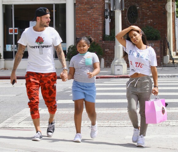 Matt Pokora, sa compagne Christina Milian enceinte et sa fille Violet Nash - Enceinte et radieuse, C.Milian se rend au glacier McConnell avec compagnon M.Pokora et sa fille V.Nash pour le goûter après avoir acheté des vêtements pour bébés. La chanteuse 'Dip it Low' et son compagnon ont annoncé sa grossesse la semaine dernière via Instagram. C'est le premier enfant du couple et le premier enfant de M.Pokora. Los Angeles, le 3 août 2019.
