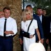 Emmanuel Macron, président de la République Française, et la première dame Brigitte Macron (avec une attelle au bras droit) arrivent à la mairie de Bormes-les-Mimosas où ils sont accueillis par François Arizzi (maire de Bormes-les-Mimosas) lors de la cérémonie de commémoration du 75ème anniversaire de la libération de la ville de Bormes-les-Mimosas, le 17 août 2019. © Dominique Jacovides/Bestimage