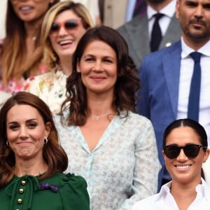 Catherine (Kate) Middleton, duchesse de Cambridge, Meghan Markle, duchesse de Sussex, et Pippa Middleton dans les tribunes lors de la finale femme de Wimbledon "Serena Williams - Simona Halep (2/6 - 2/6) à Londres, le 13 juillet 2019.
