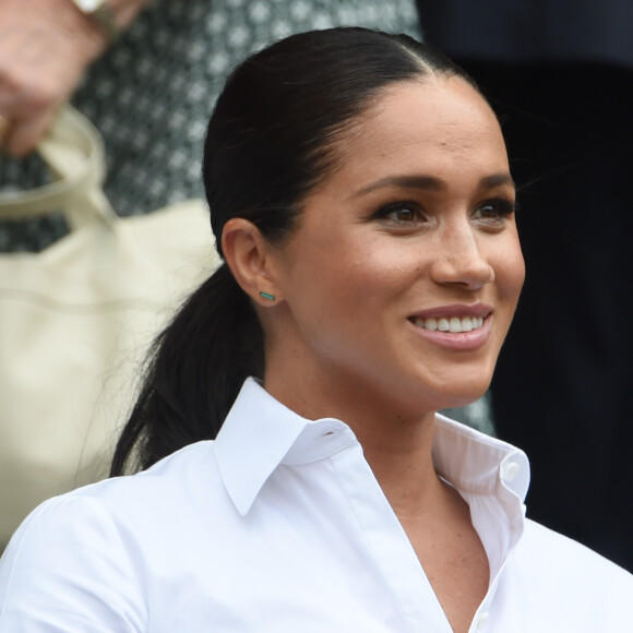 Catherine (Kate) Middleton, duchesse de Cambridge, Meghan Markle, duchesse de Sussex, et Pippa Middleton dans les tribunes lors de la finale femme de Wimbledon "Serena Williams - Simona Halep (2/6 - 2/6) à Londres, le 13 juillet 2019.
