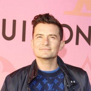 Orlando Bloom au photocall d'une soirée organisée par "Louis Vuitton" à Los Angeles, le 27 juin 2019.