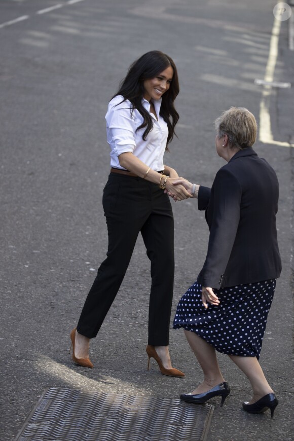 Meghan Markle, duchesse de Sussex arrive au magasin John Lewis sur Oxford Street pour le lancement de sa collection capsule Smart Works à Londres, le 12 septembre 2019.