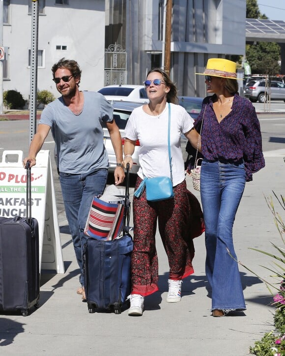Laeticia Hallyday, son compagnon Pascal Balland et son ex-femme Marine à Los Angeles, avant d'aller chercher leurs filles à l'école. Le 13 septembre 2019