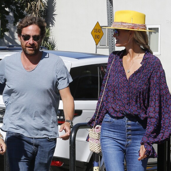 Laeticia Hallyday et son compagnon Pascal Balland ressortent d'un restaurant de sushi à Los Angeles, avant d'aller chercher leurs filles à l'école. Le 13 septembre 2019