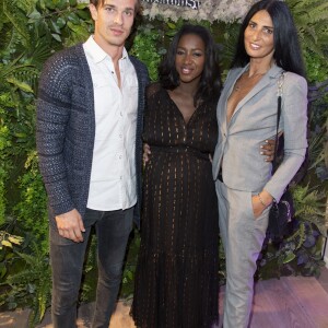 Hapsatou Sy (enceinte de son deuxième enfant) entre Thibault Perez et sa nouvelle compagne Sylvie Ortega Munos - Inauguration du Concept Store Maison 123 Paris et HapsatouSy rue de la Chaussée d'Antin dans le 9ème arrondissement de Paris, France, le 19 septembre 2019. © Pierre Perusseau/Bestimage