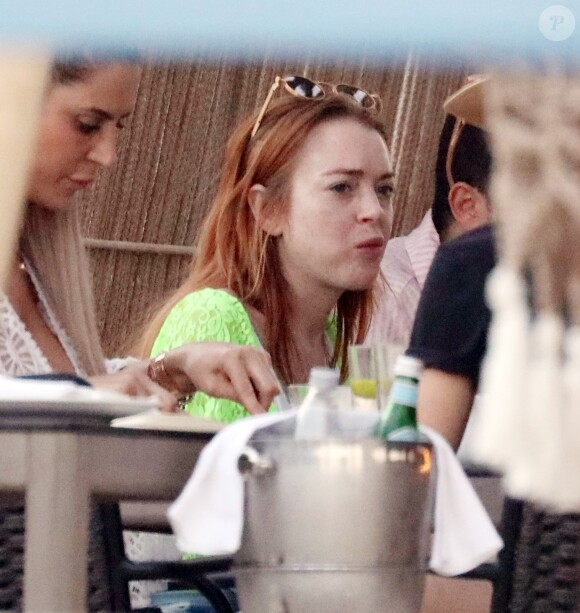 Exclusif - Lindsay Lohan fait la fête avec Panos Spentzos sur l'île de Mykonos, Grèce, le 25 juin 2019.