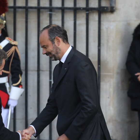 Nicolas Sarkozy et sa femme Carla Bruni, Edouard Philippe - Arrivées en l'église Saint-Sulpice pour les obsèques de l'ancien président de la République Jacques Chirac à Paris. Un service solennel sera présidé par le président de la République. Le 30 septembre 2019 © Dominique Jacovides / Bestimage