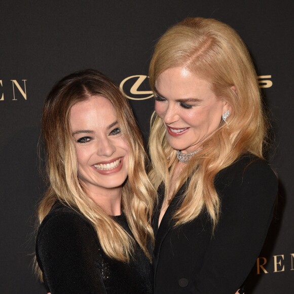 Margot Robbie et Nicole Kidman lors de la soirée ELLE Women In Hollywood à l'hôtel Four Seasons à Beverly Hills, le 14 octobre 2019.