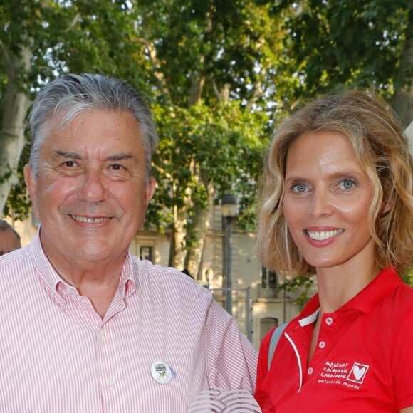 Jean-Paul Fournier (maire de Nîmes) et Sylvie Tellier - Opération "Pétanque du coeur" dans le cadre de l'étape du coeur au profit de l'association "Mécénat Chirurgie Cardiaque" dans les jardins de la fontaine à Nîmes, le 22 juillet 2019. © Christophe Clovis / Bestimage