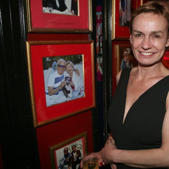 Sandrine Bonnaire et sa fille Jeanne - Michou fête son 88ème anniversaire dans son cabaret avec ses amis à Paris le 18 juin 2019. © JLPPA/Bestimage