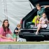 Kate Middleton, duchesse de Cambridge avec ses enfants, le prince George de Cambridge, la princesse Charlotte de Cambridge et le prince Louis de Cambridge lors d'un match de polo de bienfaisance King Power Royal Charity Polo Day à Wokinghan, comté de Berkshire, Royaume Uni, le 10 juillet 2019.
