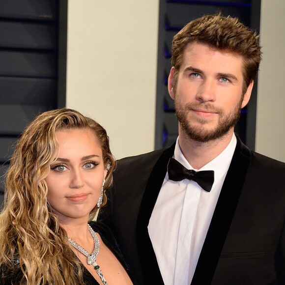 Miley Cyrus et son mari Liam Hemsworth à la soirée Vanity Fair Oscar Party à Los Angeles, le 24 février 2019