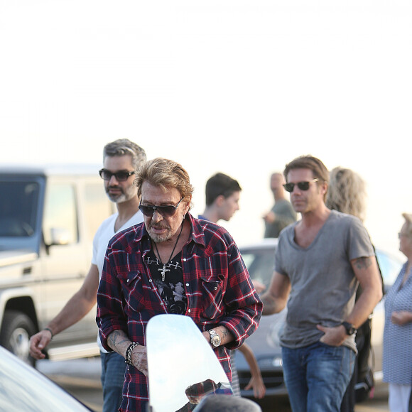 Le prince Emmanuel-Philibert de Savoie, Johnny Hallyday, Francois Vincentelli - Johnny Hallyday conduit la Maserati du prince Emmanuel-Philibert de Savoie a Pacific Palisades, Los Angeles le 19 janvier 2014.