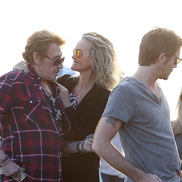 Johnny et Laeticia Hallyday avec leurs filles Jade et Joy, le prince Emmanuel-Philibert de Savoie, Francois Vincentelli - Johnny Hallyday conduit la Maserati du prince Emmanuel-Philibert de Savoie a Pacific Palisades, Los Angeles le 19 janvier 2014.