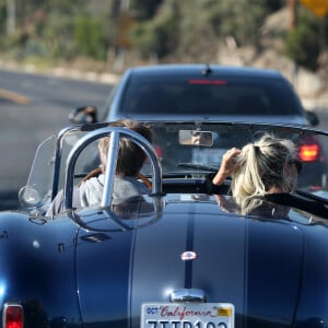 Le prince Emmanuel-Philibert de Savoie et Laeticia Hallyday - Le prince Emmanuel-Philibert de Savoie est au volant de la voiture "Shelby Cobra" sport de Johnny avec Laeticia Hallyday direction le restaurant SoHo House de Malibu en famille à Los Angeles, le 3 novembre 2019.